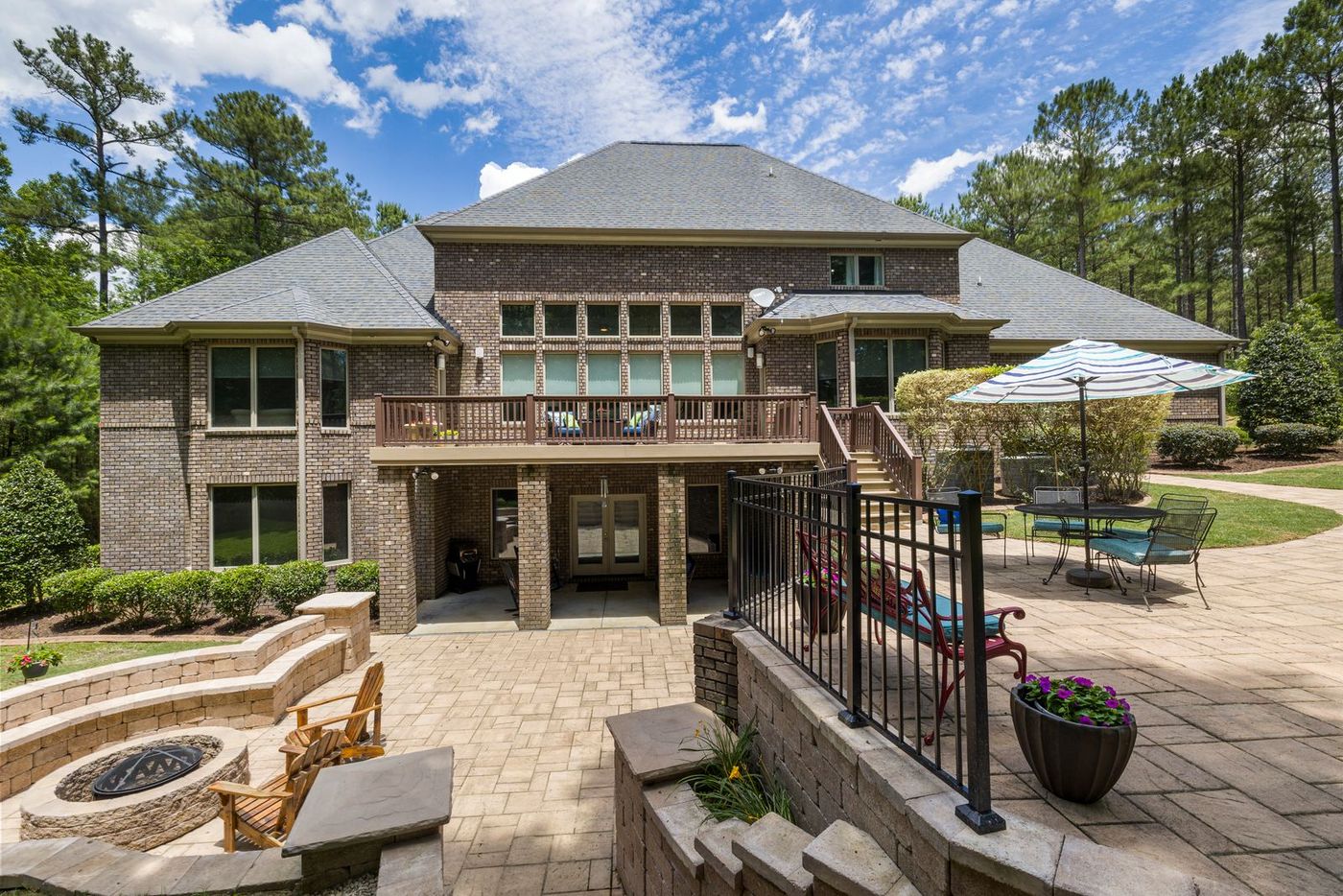 Completed residential landscape with terrace and fire pit